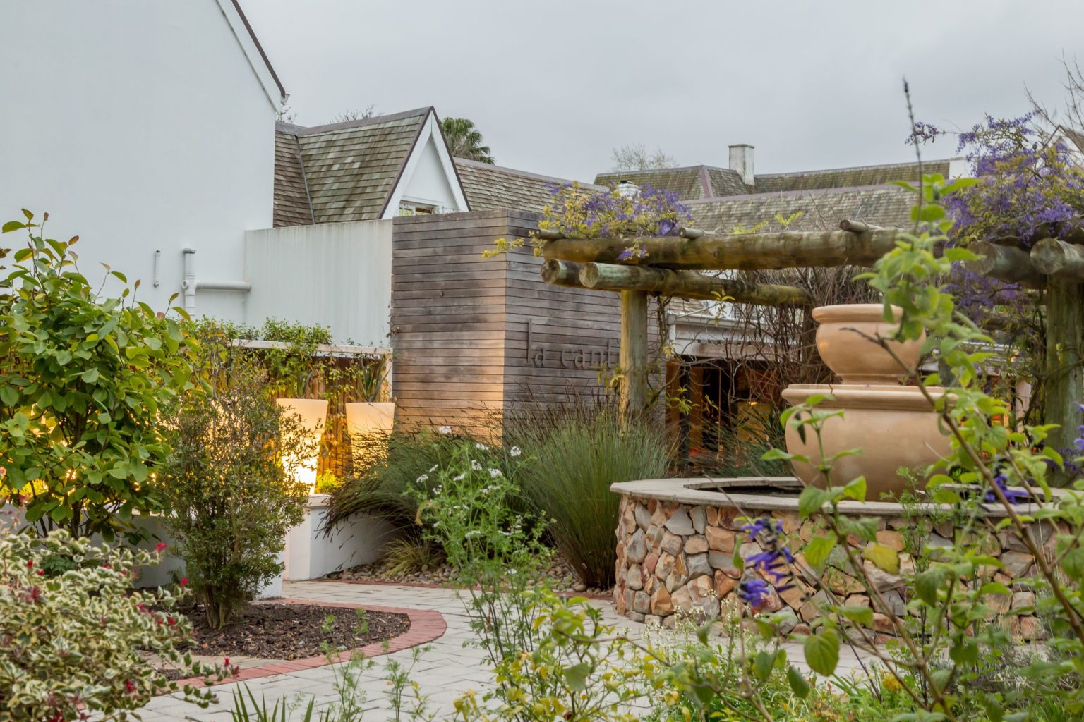 Large fountain ad contemporary outdoor courtyard