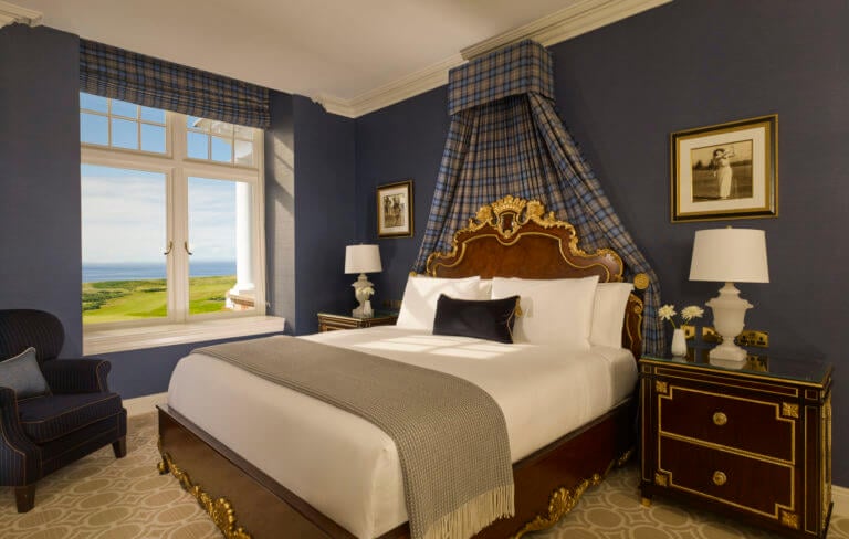 Grandiosely appointed bedroom at Trump Turnberry Resort
