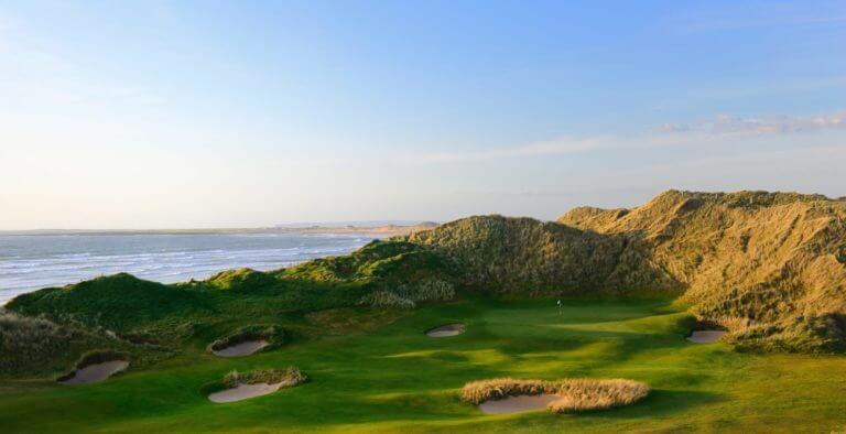 The first hole is carved out of sand dunes in Ireland