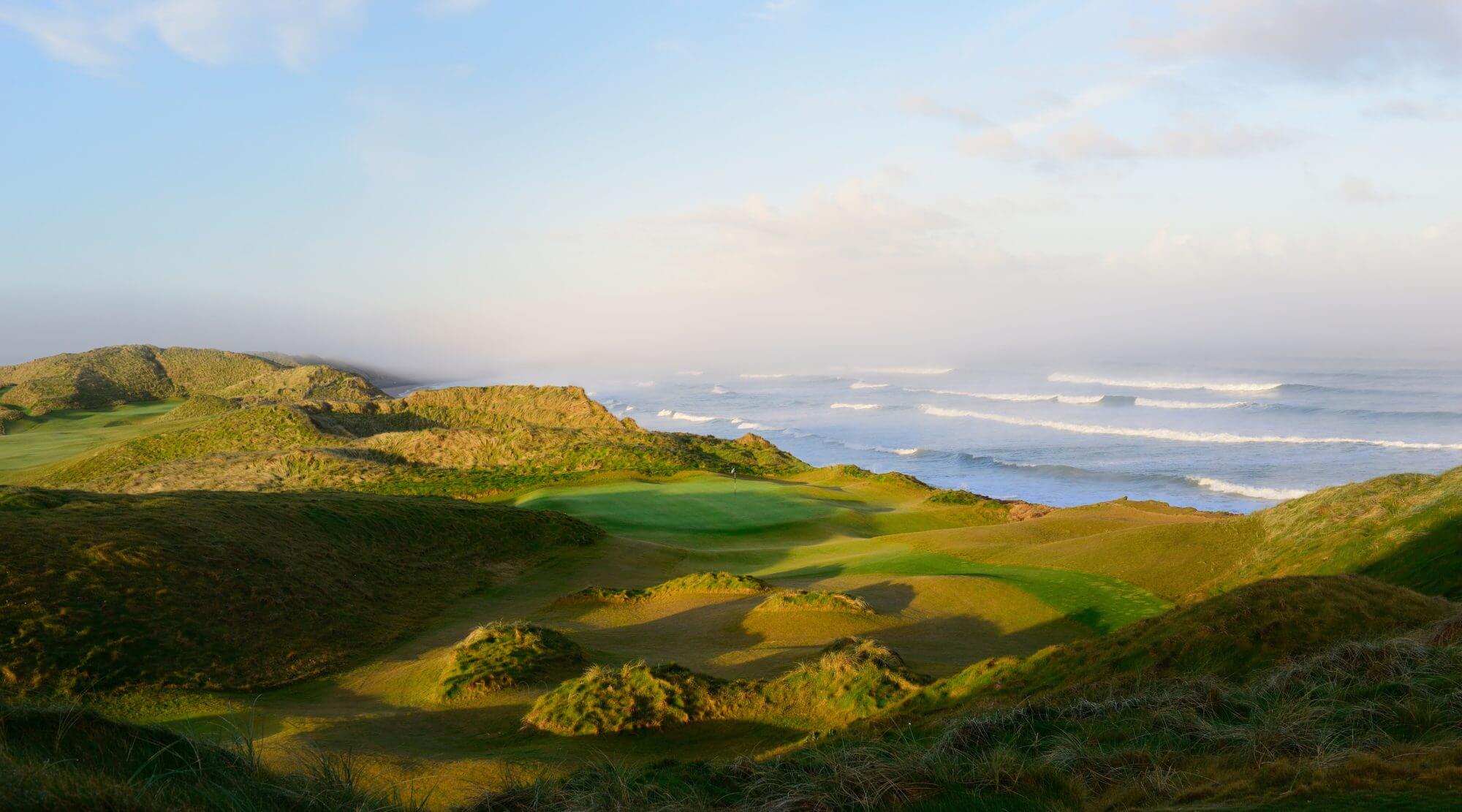 The fourteenth green overlooks the ocean at Trump Doonbeg
