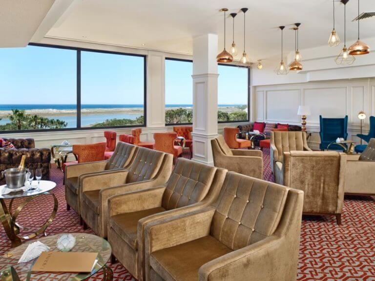 Indoor lounge seating with ocean views