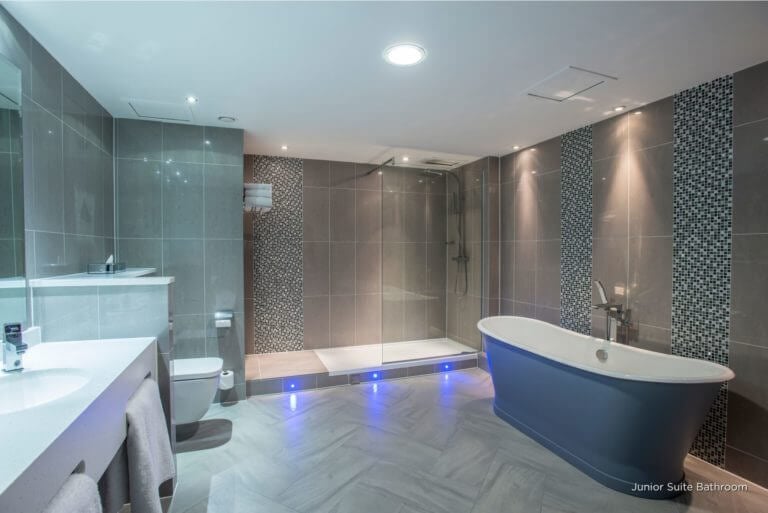 Large bathroom with separate bath and walk-in shower