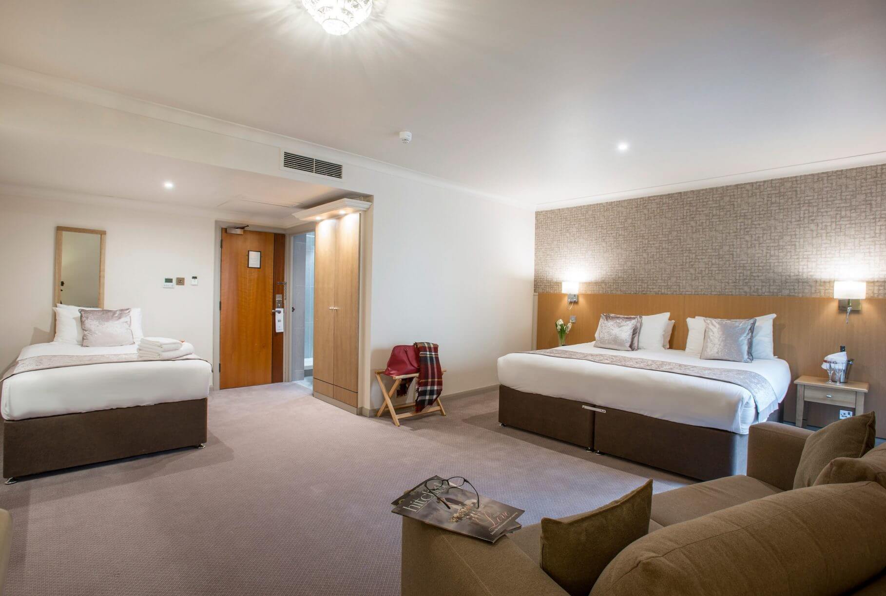 Two beds make a triple occupancy bedroom at Vale Resort