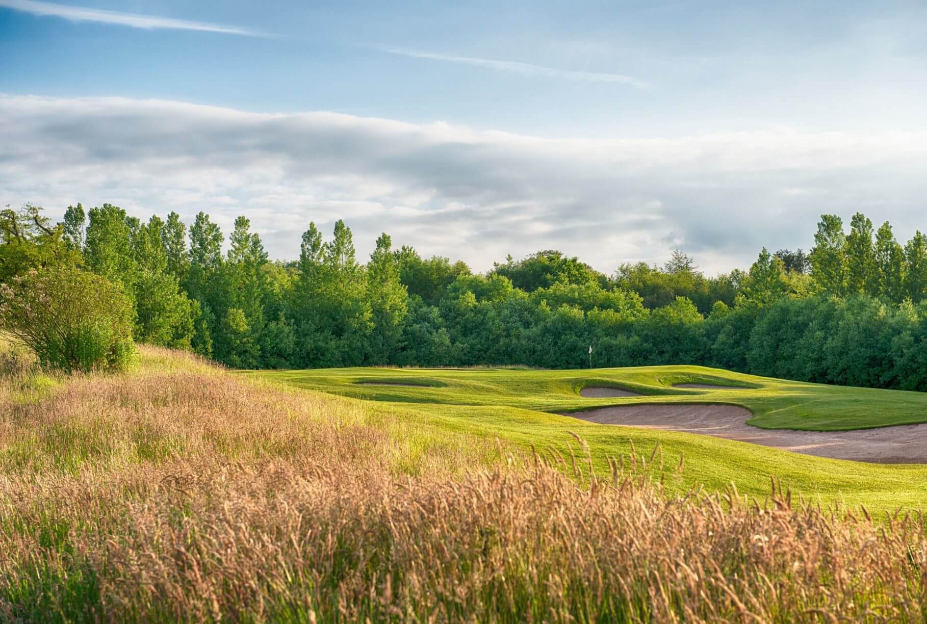 Long grass flanks a fairway at Vale Resort