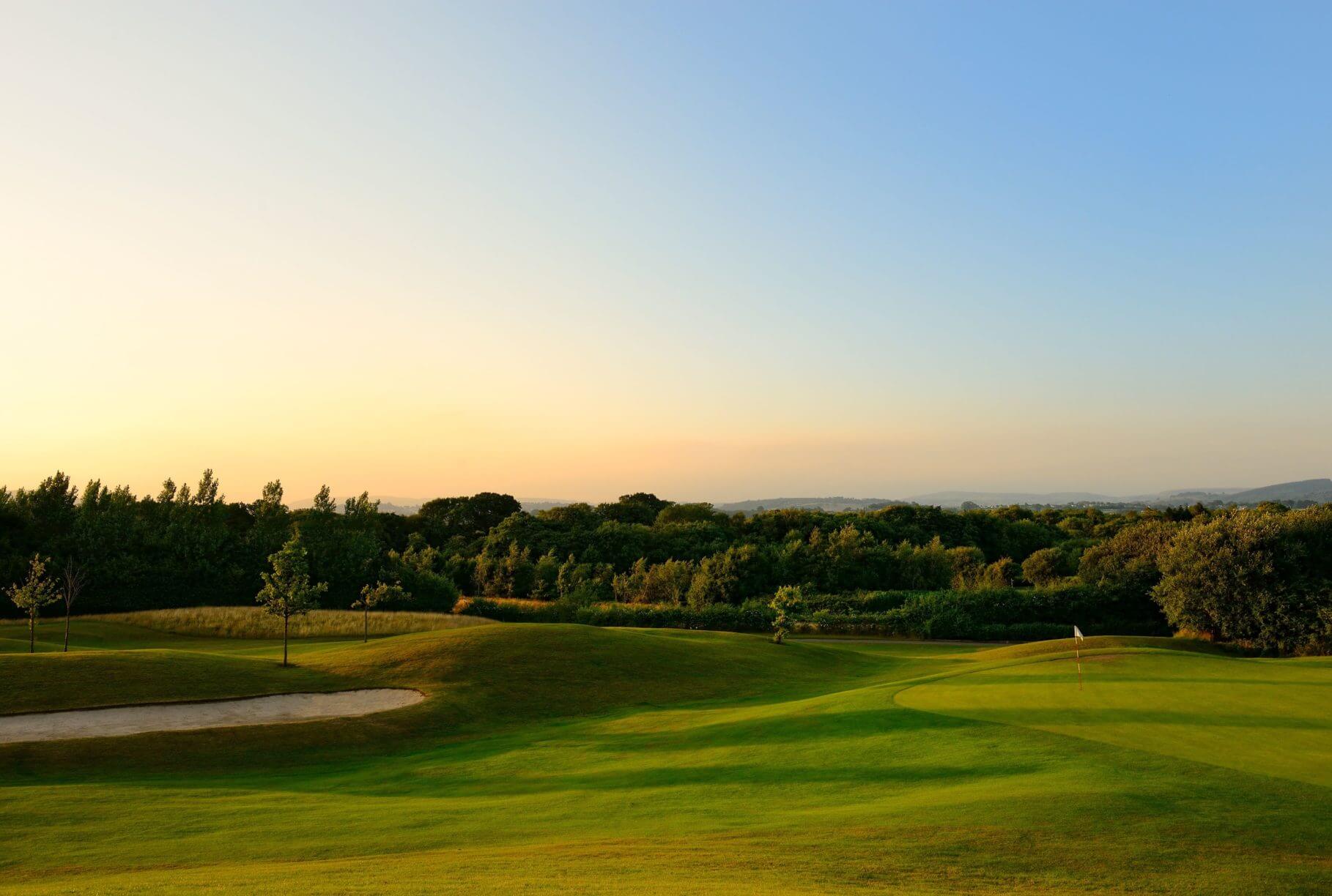 Setting sun casts shadows over the Vale Resort golf course