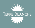 White Terre Blanche Logo on blue background