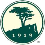 Green and yellow Pebble Beach 1919 logo