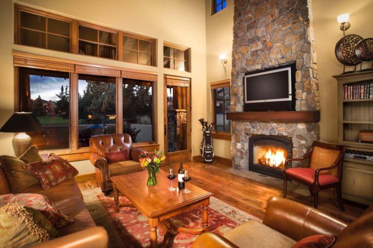 A large open living room with fire place at Pronghorn Resort