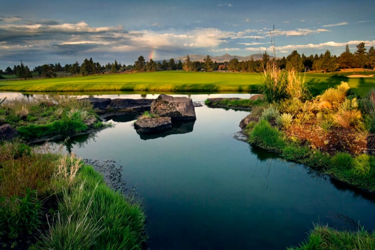A lake stands on the Nicklaus course at Pronghorn Resort
