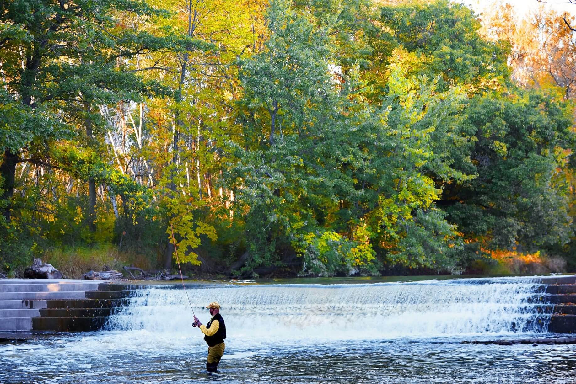 Man fishes in the middle of a lake