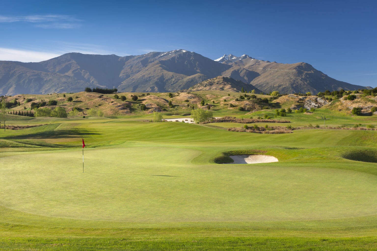 Mountains surround the golf course on all sides