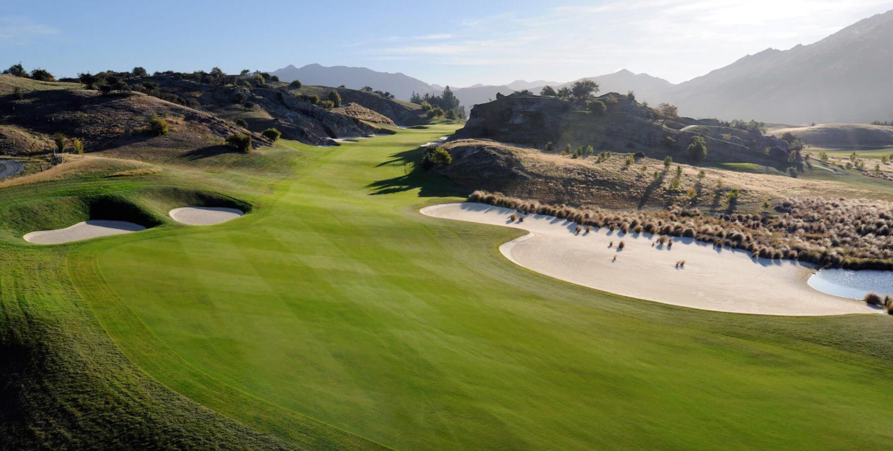 Large bunker runs along the side of a fairway