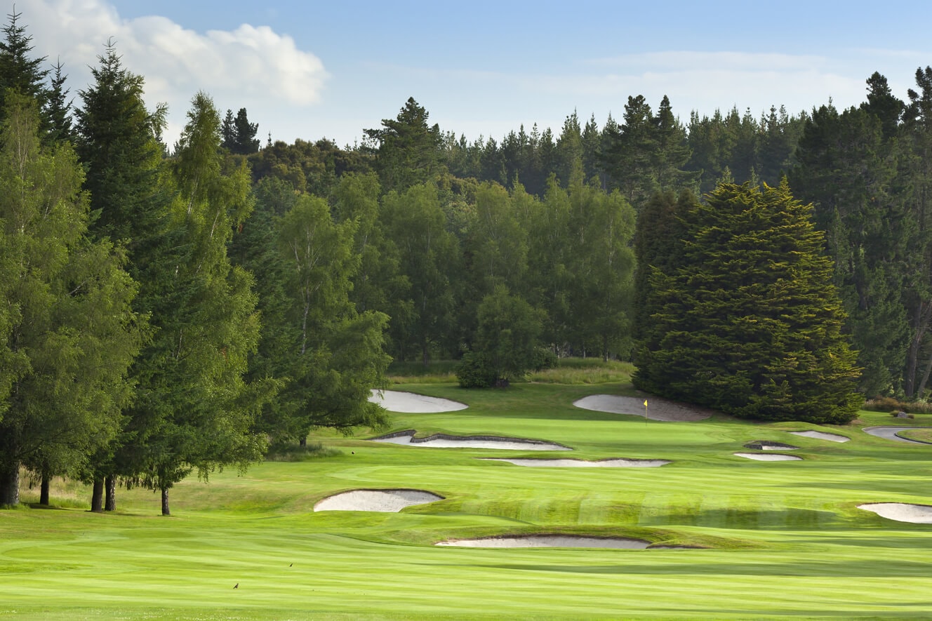 Par four golf hole looking toward the green