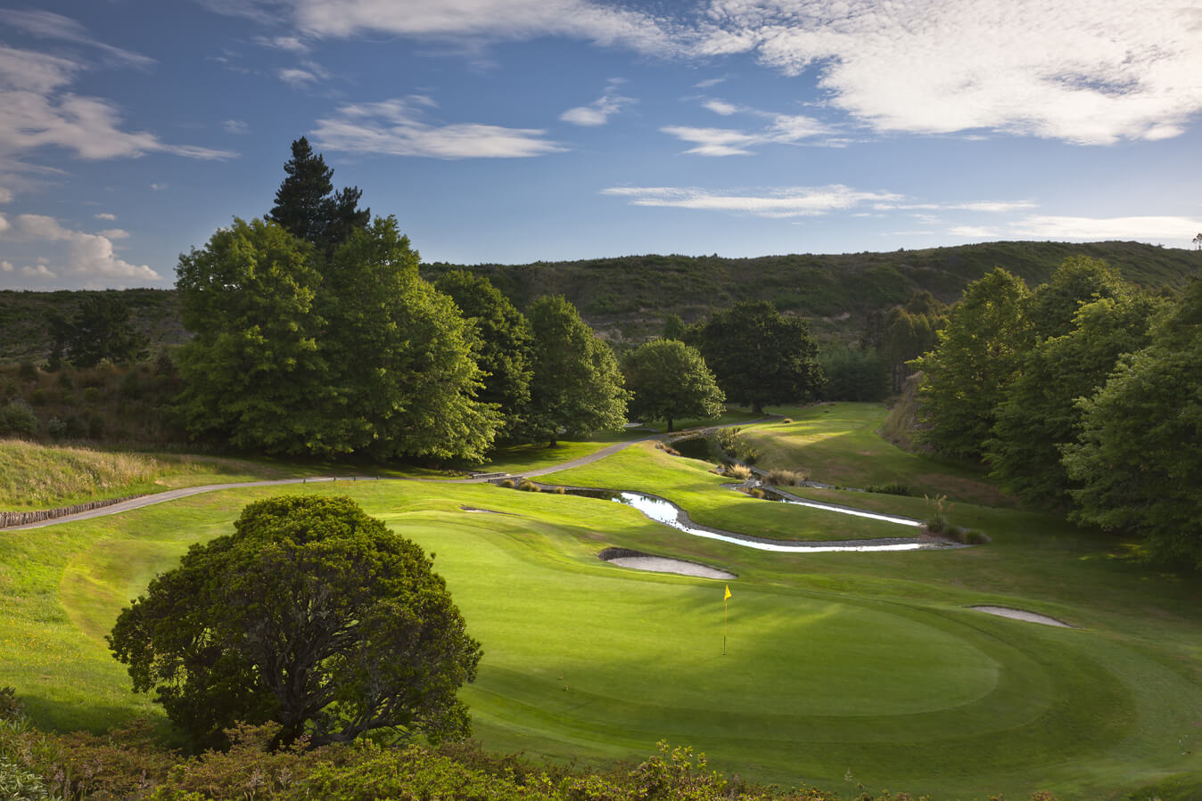 Overlooking a green and forested horizon at Wairakei golf course