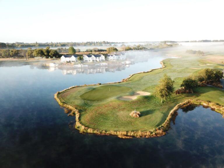 The eighth green stands on a peninsula surrounded by water