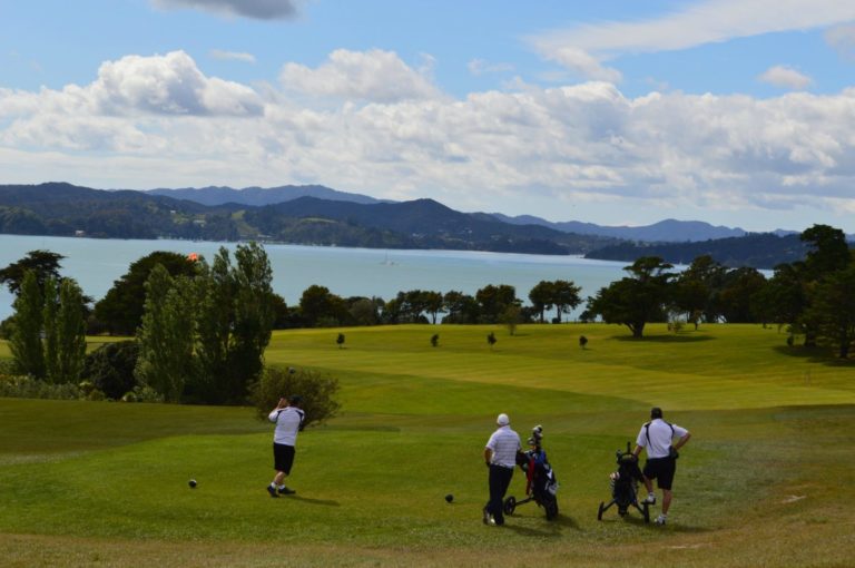 Golfers tee off on the eleventh hole of Waitangi Golf Course