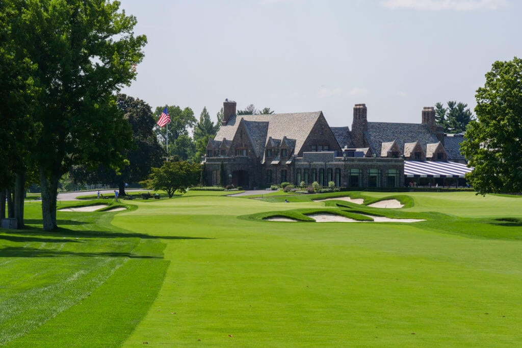 Ninth hole at Winged Foot Golf Club looking at Clubhouse