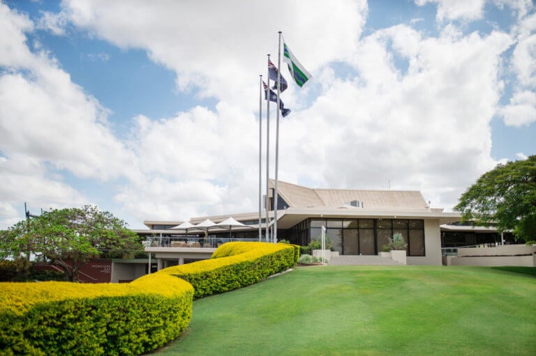 Flags fly above the Indooroopilly clubhouse