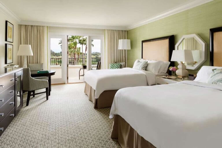 Twin beds occupy a Resort guestroom at Monarch Beach Resort