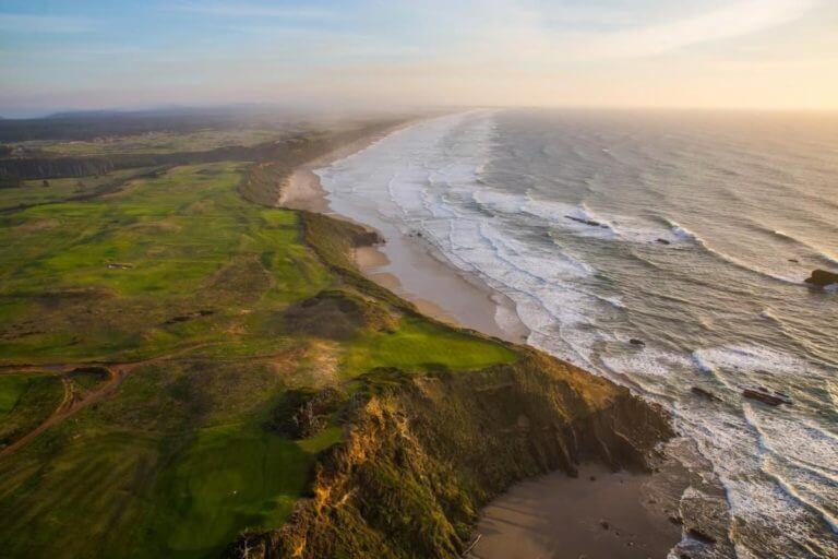 Aerial view south along Pacific Coastline adjacent to Sheep Ranch golf course
