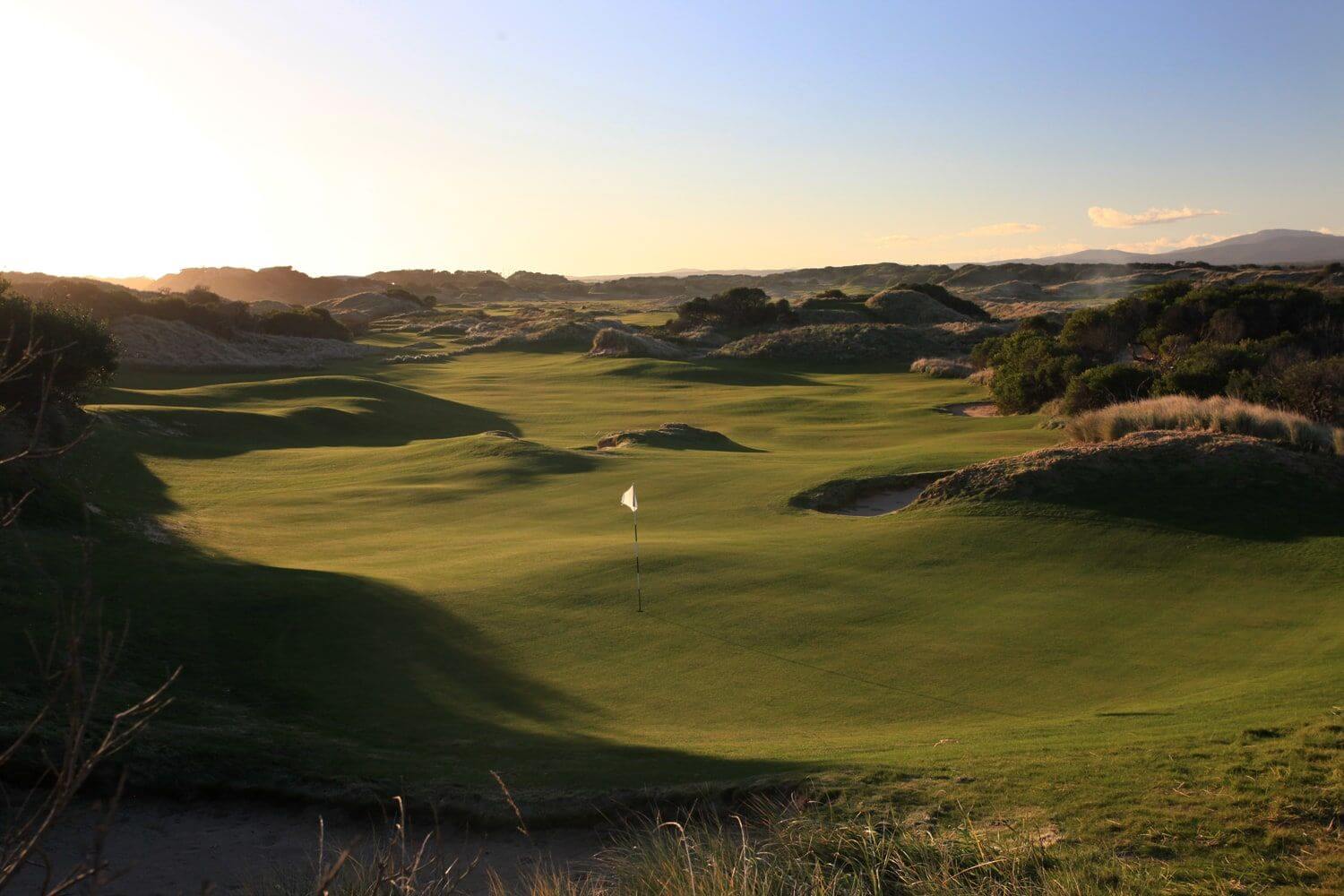 Raised green looking towards undulating links land