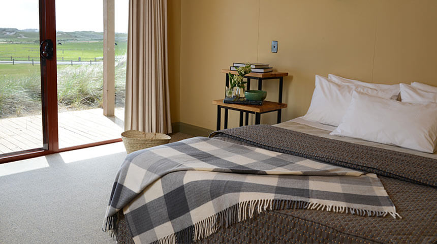 Comfortable bed in a Barnbougle cottage
