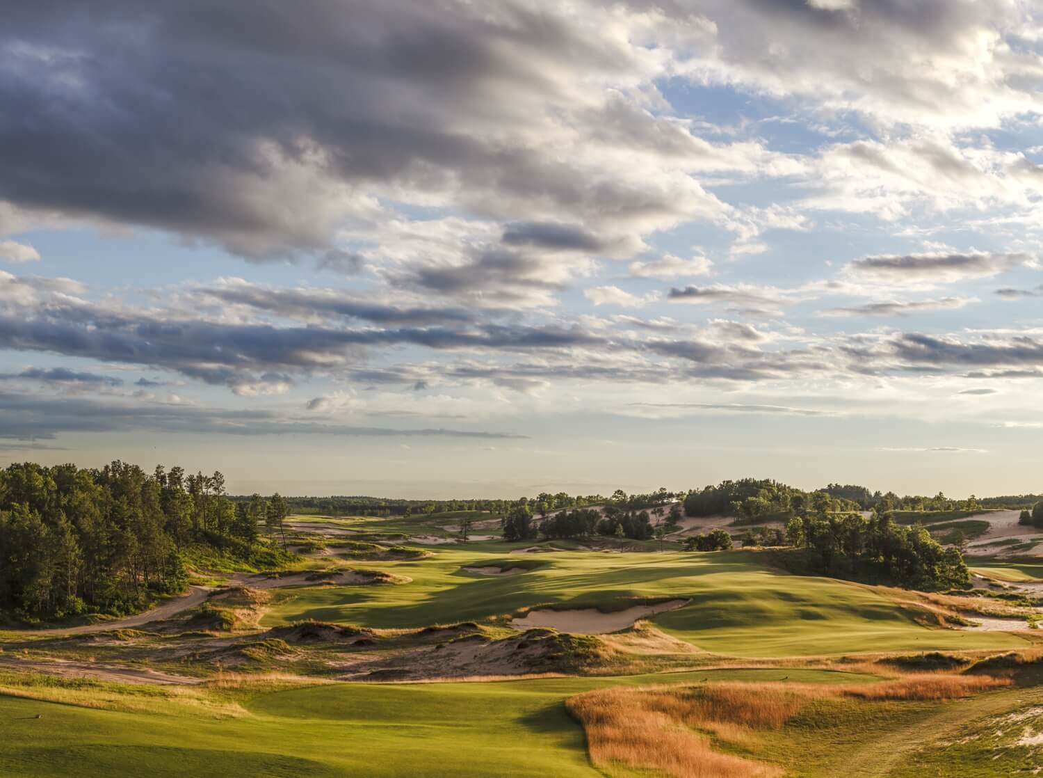 Sunset over the 10th hole at Sand Valley golf course