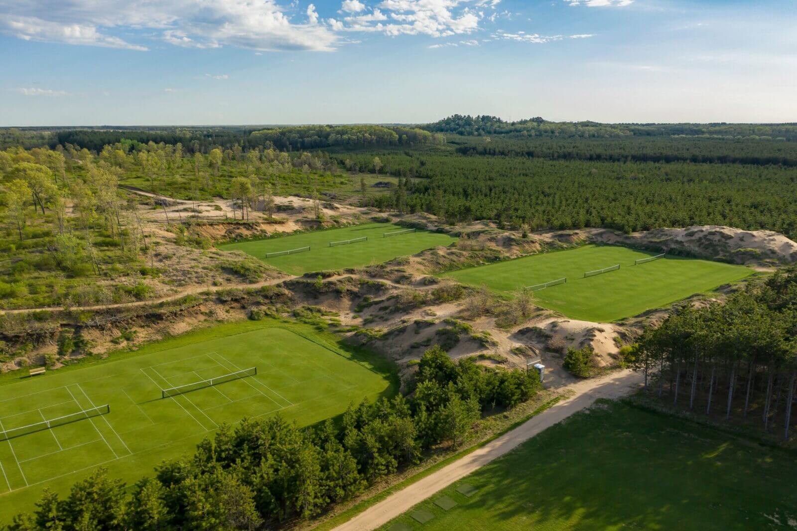 Grass tennis courts at Sand Valley Resort