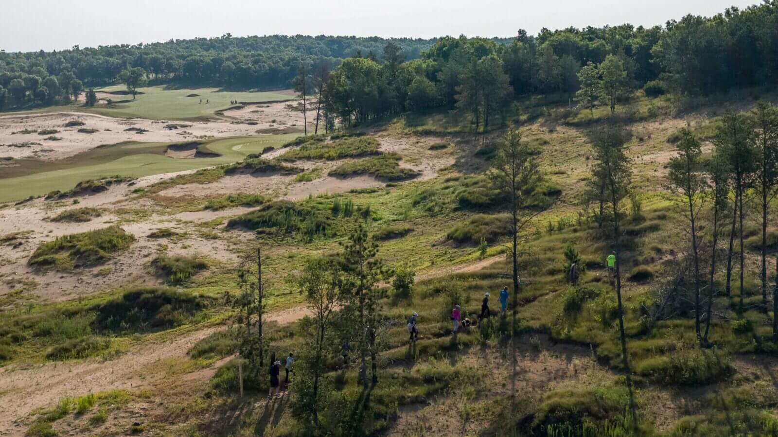 Hikers on trails at Sand Valley Resort