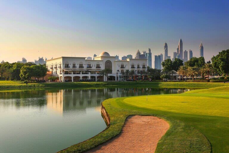 Clubhouse and Dubai skyline at Montgomerie Golf Club