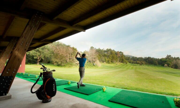 Man practices golf at Penha Longa