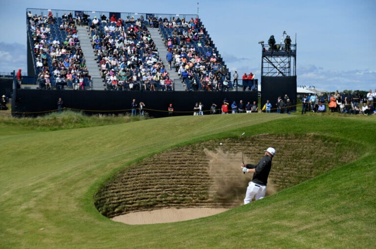 Golfer hits out of bunker