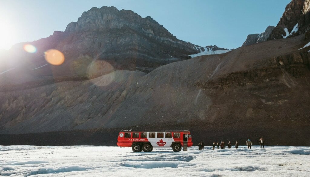 Truck and people on a glacier