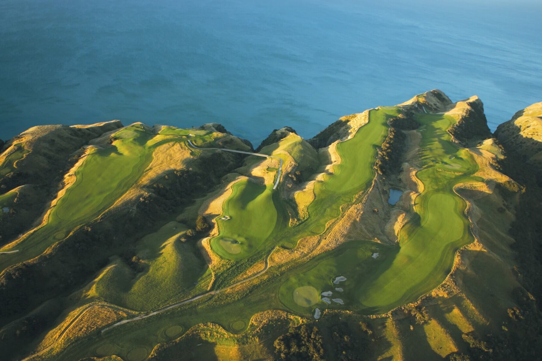 Aerial View of golf course next to the ocean