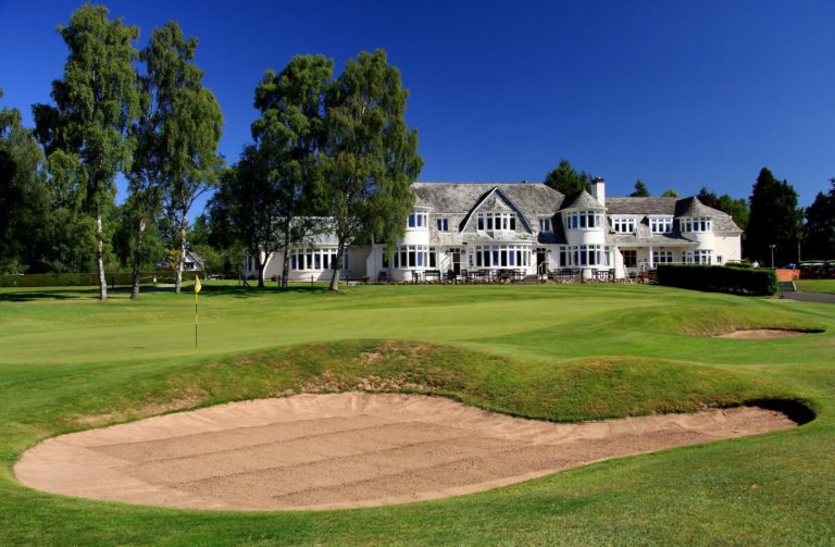 View of the 18th and white clubhouse at Blairgowrie Golf Club, Scotland, United Kingdom