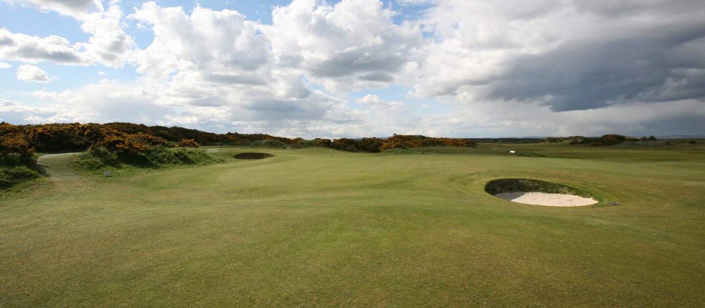 Pot bunkers pepper the 4th hole on The Jubilee Course, St Andrews, Links, Scotland, United Kingdom