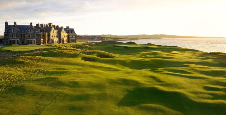 Dusk image of the 18th hole and Trump Doonbeg Resort