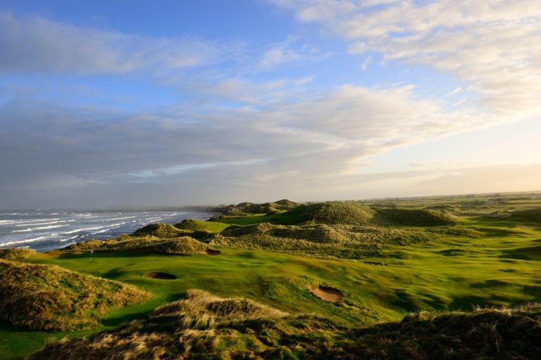 Landscape contrasting the ocean with the golf course, Trump International Doonbeg, County Clare, Ireland