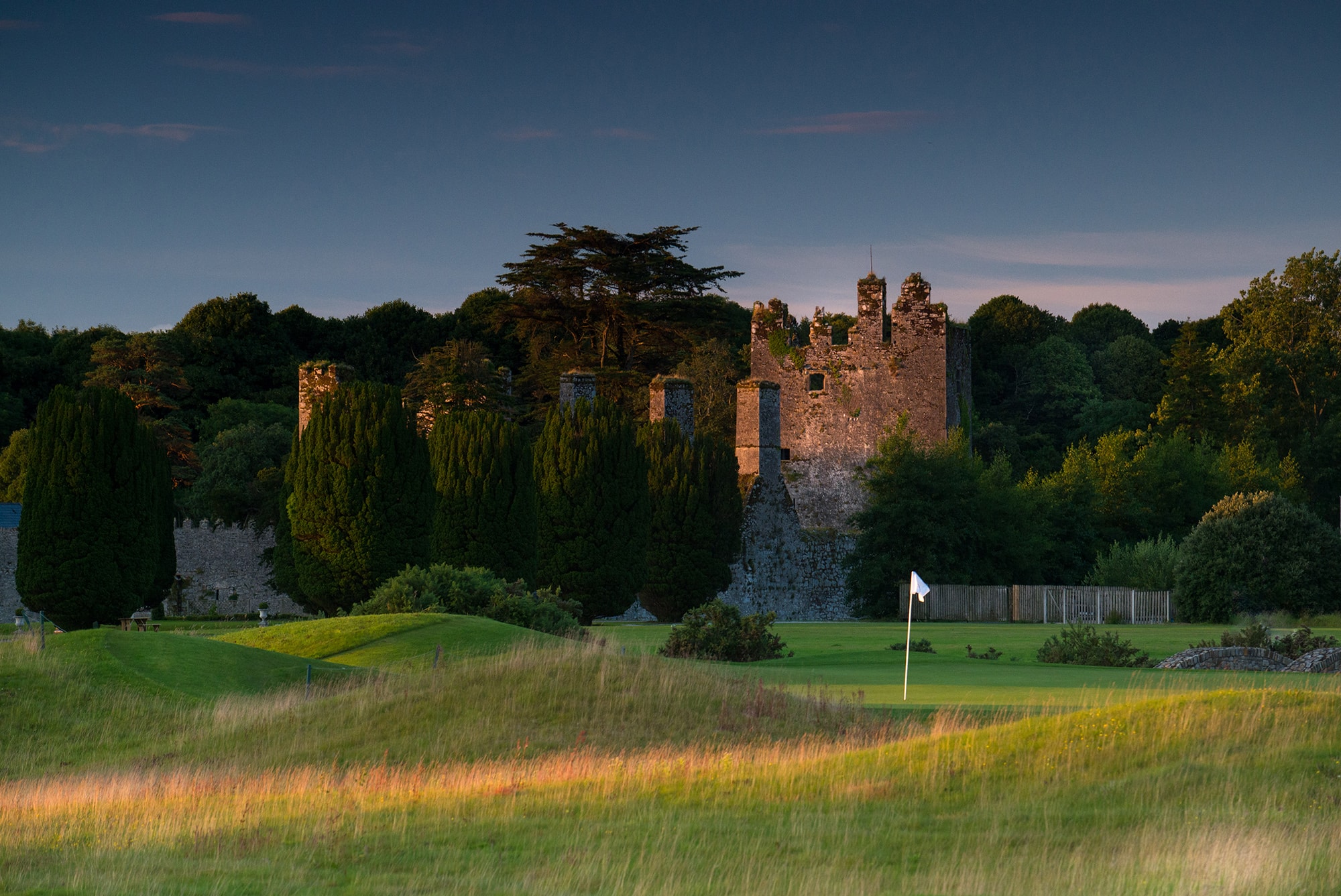 Old castle ruins feature on the golf course at Castlemartyr Resort, Cork, Ireland