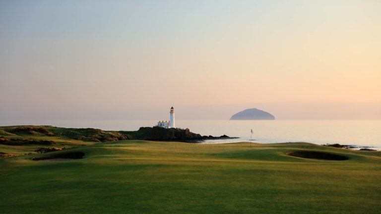 Calm Seas surround the Ailsa Craig and King Robert The Bruce Course , Trump Resort, Turnberry, Scotland, United Kingdom