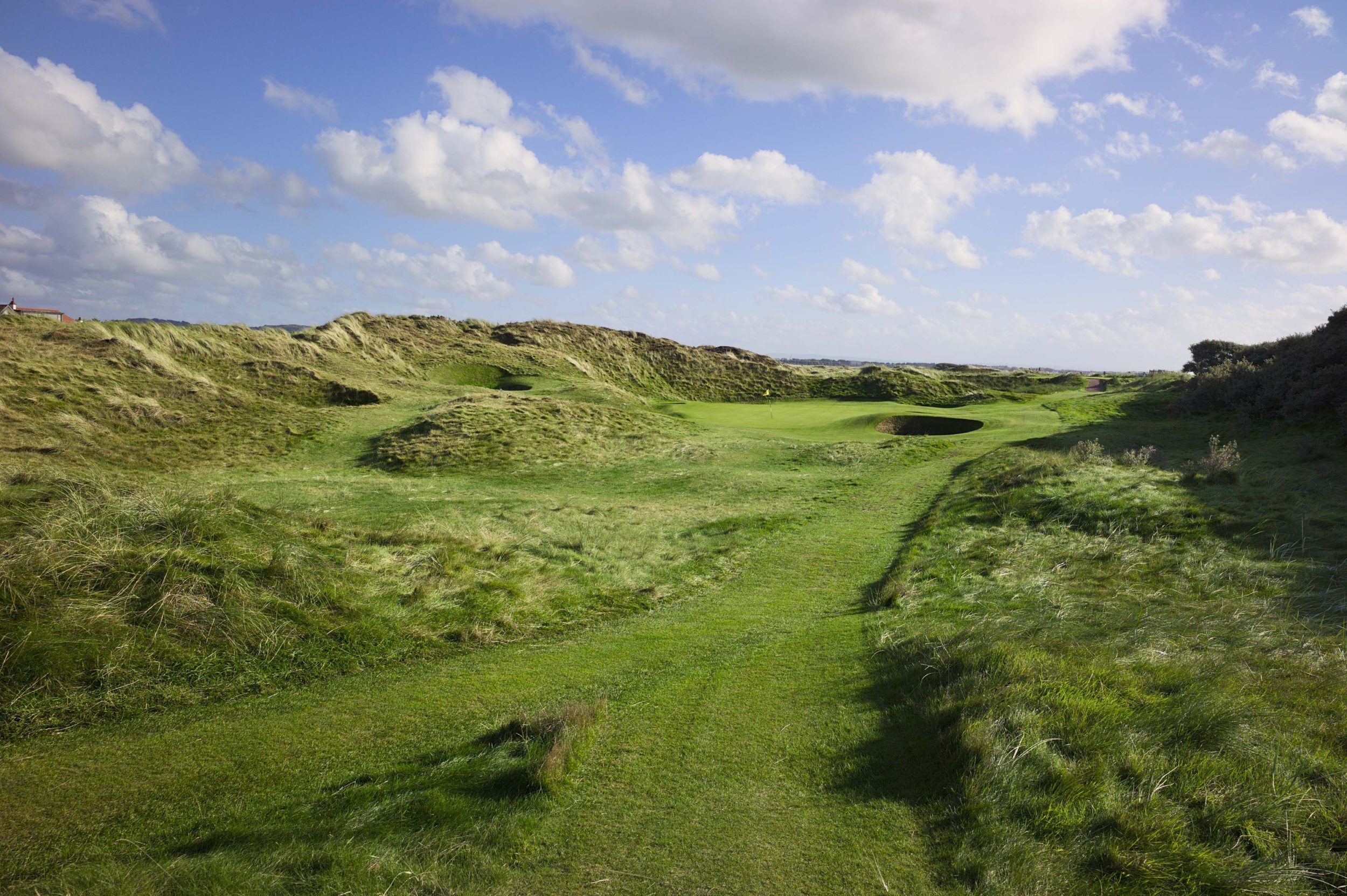 Undulating hills give respite for a par-4 at The Western Gailes Golf Club, Ayrshire, Scotland, United Kingdom