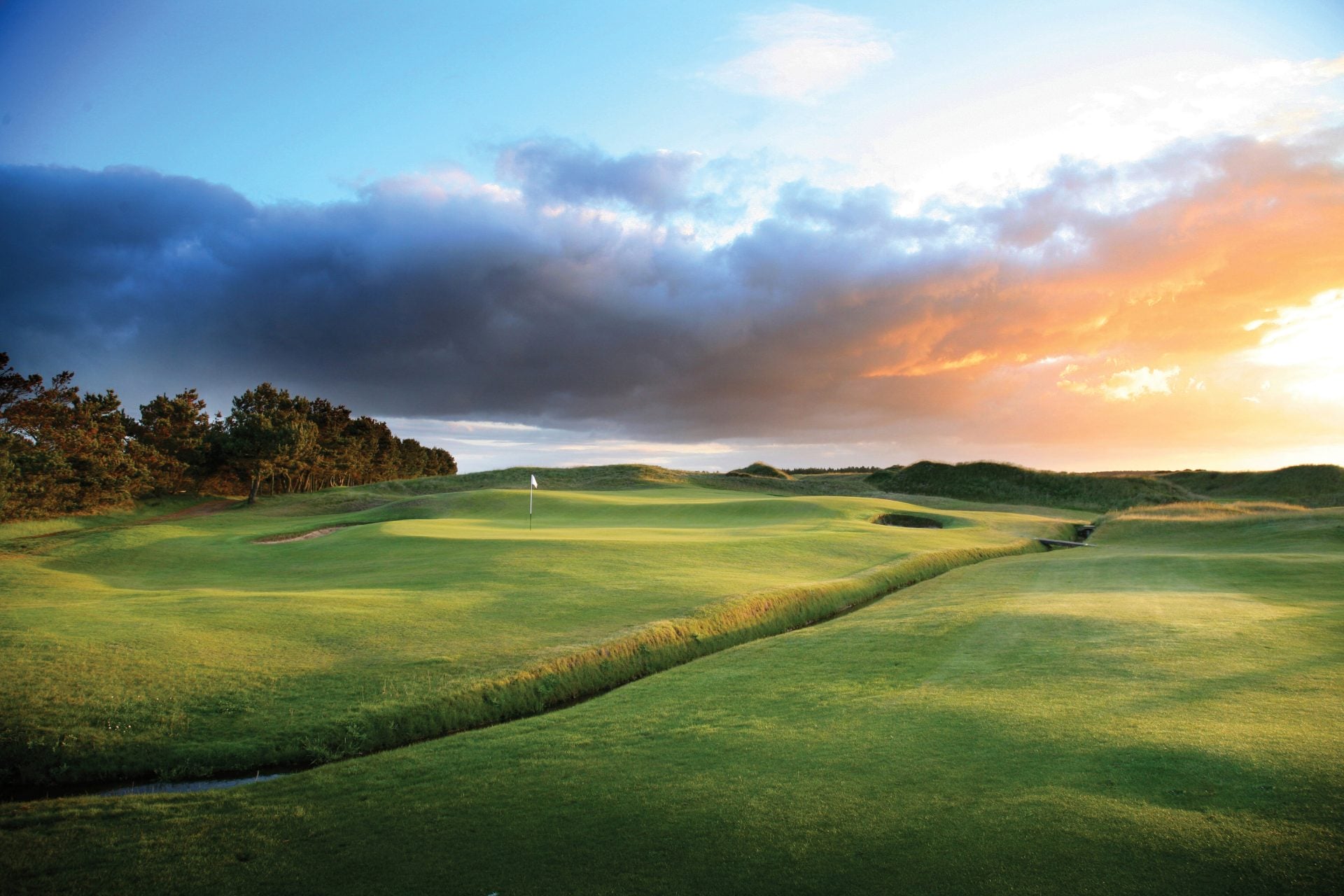 The 13th hole has a deep trench running across the approach to the green at Dundonald Links, Scotland, United Kingdom