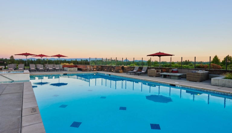 Image overlooking the skyline from the pool at Tetherow Resort, Bend, Oregon, USA
