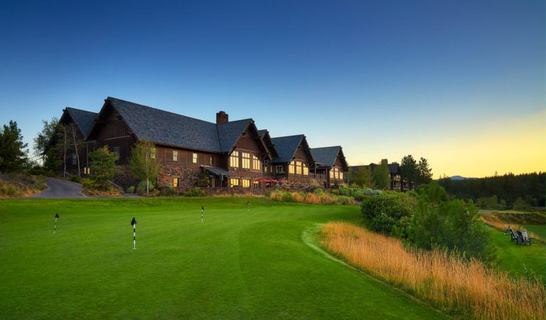 Image displaying the putting green and resort building at Tetherow Resort, Bend, Oregon, USA