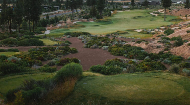 Image of the 6th tee boxes and fairway on the golf course at Tetherow Resort, Bend, Oregon, USA