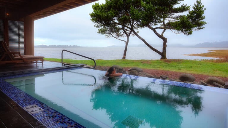 Image of a woman in a private pool at Salishan Resort, Oregon, USA