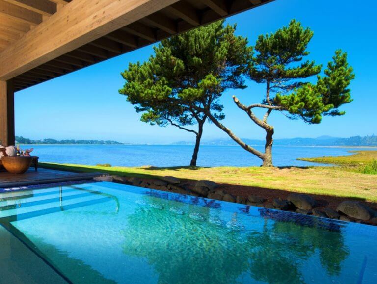 Image depicting a private pool and bright blue skies, Salishan Resort, Oregon, USA