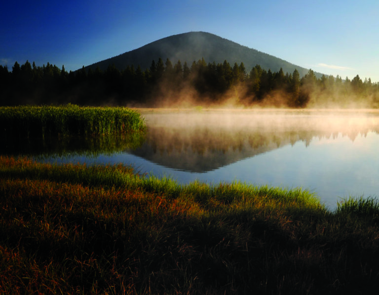 Image of the black butte from across a lake,Black Butte Ranch, Oregon, USA