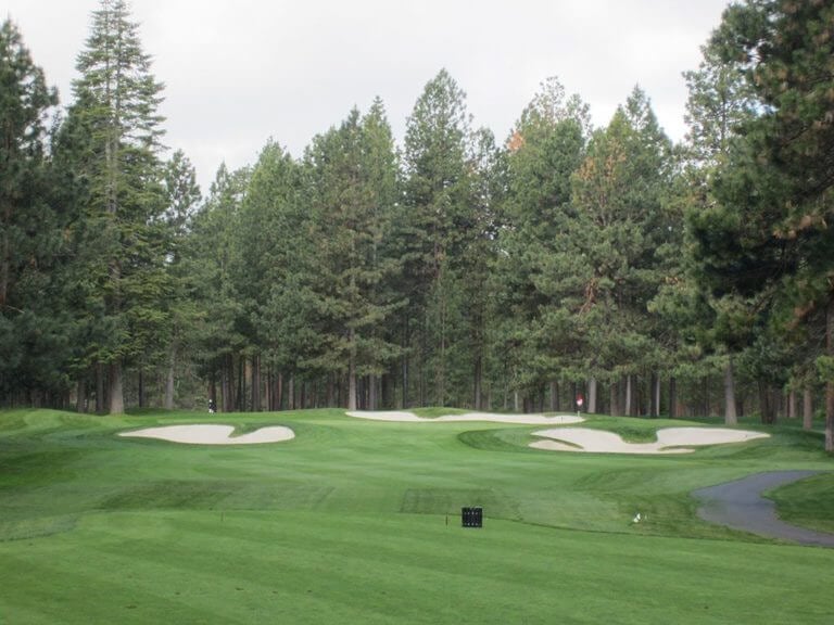 Image of the 4th hole and surrounding forest on the Big Meadow Golf Course, Black Butte Ranch, Oregon, USA