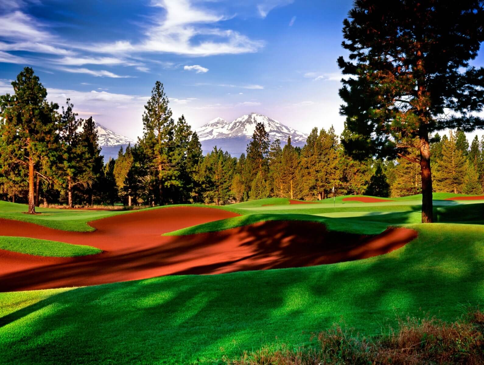 View of the Aspen Lakes Golf Course and signature red bunkers